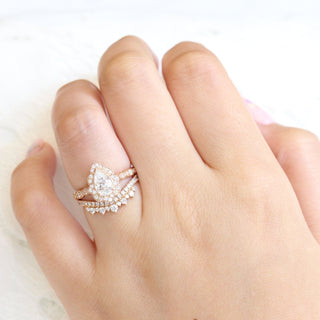 Delicate 1.0ct pear halo moissanite ring front view