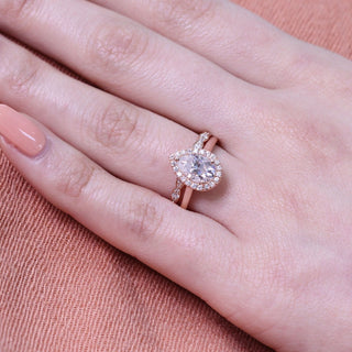 Lustrous 1.50ct pear halo moissanite ring front view