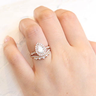Graceful 1.50ct pear halo moissanite ring front view