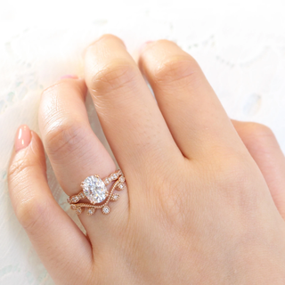 Elegant 2.0ct oval halo moissanite ring front view