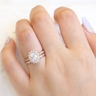 Luminous 1.50ct oval halo moissanite ring front view