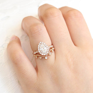 Gorgeous 1.50ct pear halo moissanite ring front view