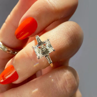 Graceful 1.91ct emerald three stone moissanite ring detail view of the band