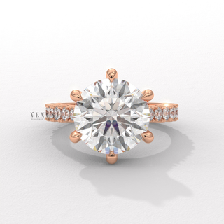 Round cut moissanite engagement ring with cathedral setting