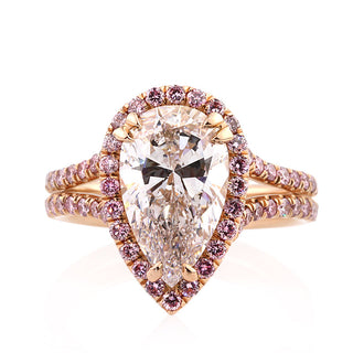 Vivid pear halo split shank moissanite ring front view
