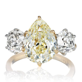yellow moissanite engagement ring pear old mine front view