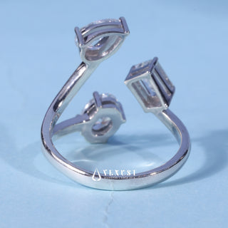 Angled view of the Emerald Oval Pear Three Stone Moissanite Engagement Ring band and setting