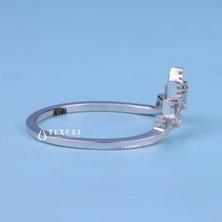 Modern round moissanite wedding band side profile view
