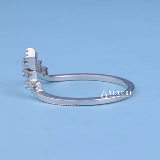 Modern round moissanite wedding band close up of the setting