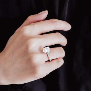 Brilliant 2.50ct oval hidden halo moissanite ring angled view showing its sparkle