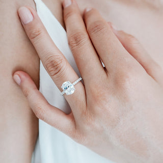 Brilliant 2.50ct oval hidden halo moissanite ring side profile view