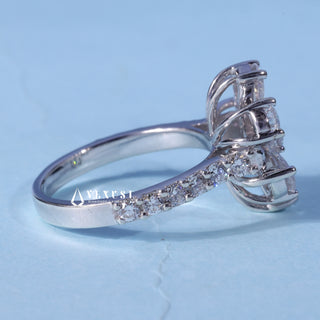 Angled view of the Round Pear Moissanite Flower Cluster Engagement Ring band and setting
