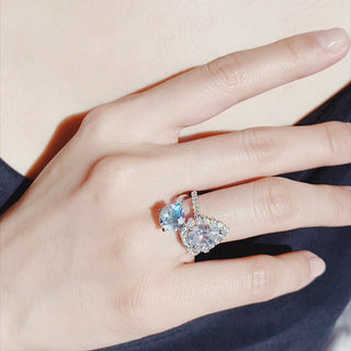 Luminous 2.0ct round solitaire moissanite ring shown on a finger image 2
