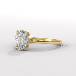 Oval shaped engagement ring with raised center stone