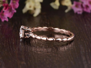 Lustrous 1.35ct round solitaire moissanite ring close up of the setting