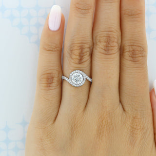 Elegant 1.0ct round halo moissanite ring angled view showing its sparkle image 2