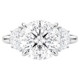 Round brilliant three stone moissanite engagement ring front view