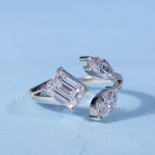 Three Stone Marquise Moissanite Emerald Cut Engagement Ring front view with upright centre stone