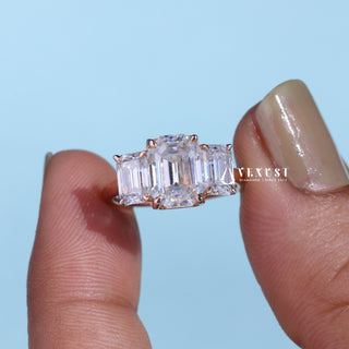Brilliant 2.0ct emerald three stone moissanite ring angled view showing its sparkle