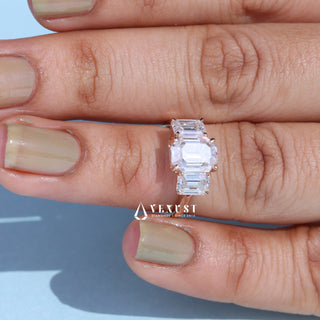 Dazzling 2.0ct emerald three stone moissanite ring three quarter angled view