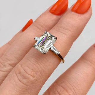 Graceful 1.91ct emerald three stone moissanite ring macro detail of the stones