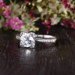 Brilliant 1.60ct round solitaire moissanite ring shown on a finger