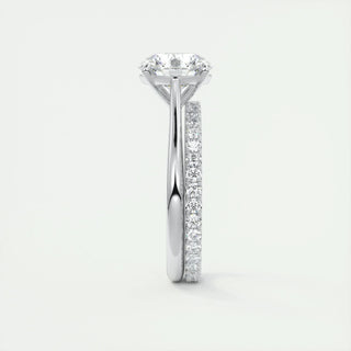 Modern 2.0ct round solitaire moissanite ring shown on a finger