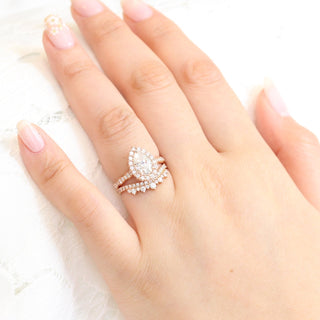 Graceful 1.50ct pear halo moissanite ring side profile view
