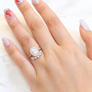 Dazzling 1.50ct oval halo moissanite ring shown on a finger