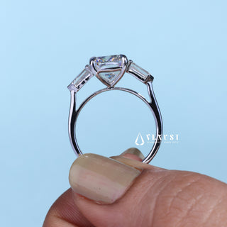 Timeless 2.50ct cushion three stone moissanite ring shown on a finger