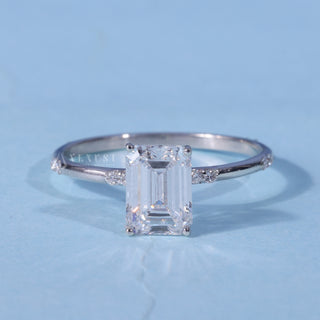 Moissanite Emerald Cut Engagement Ring front view with upright centre stone