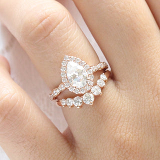 Brilliant 1.60ct pear halo moissanite ring top view