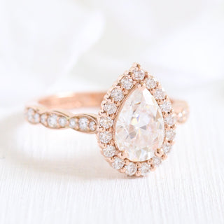 Graceful 1.50ct pear halo moissanite ring top view