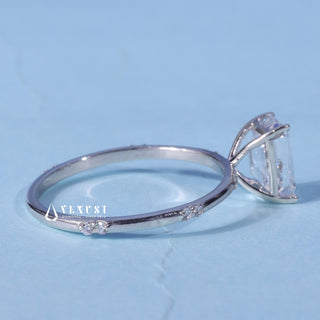 Angled view of the Moissanite Emerald Cut Engagement Ring band and setting