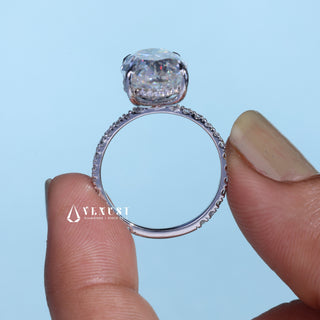 Graceful 6.0ct oval hidden halo moissanite ring close up of the setting