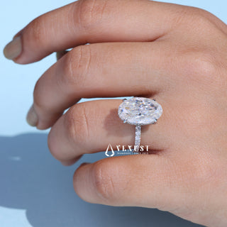 Graceful 6.0ct oval hidden halo moissanite ring overhead view