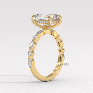 Side profile of a round cut moissanite engagement ring with a hidden halo and pave band from the left