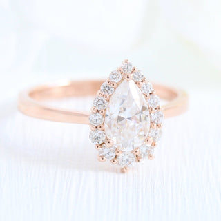 Radiant 1.0ct pear halo moissanite ring three quarter angled view