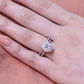 Lustrous 1.50ct pear halo moissanite ring sparkle close up