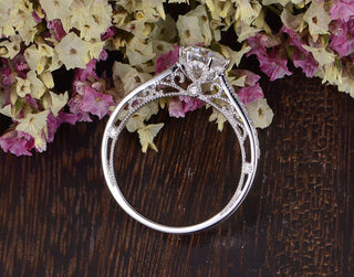 Gorgeous 1.35ct round solitaire moissanite ring three quarter angled view