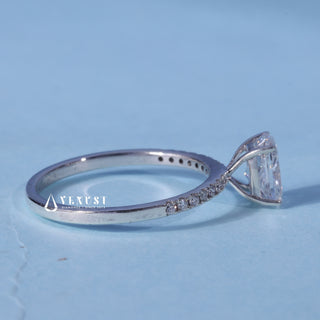 Angled view of the Pave Elongated Cushion Cut Moissanite Ring band and setting