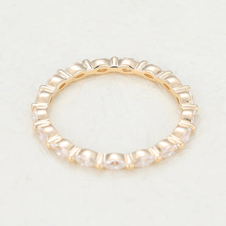 Graceful 1.44ct marquise full eternity moissanite wedding band shown on a finger