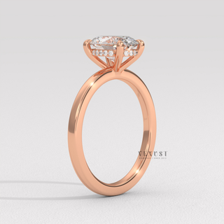 Oval moissanite engagement ring on hand