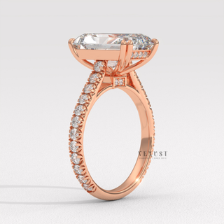 Side profile of a radiant cut moissanite engagement ring with a pave band from the right