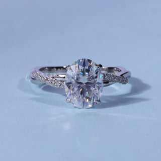 Oval Cut Pave Infinity Moissanite Engagement Ring front view with upright centre stone