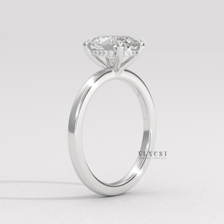 Engagement ring oval cut with hidden halo design