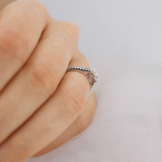 Timeless 0.50ct round halo moissanite wedding band three quarter angled view