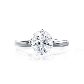 Refined 1.20ct round solitaire moissanite ring angled view showing its sparkle