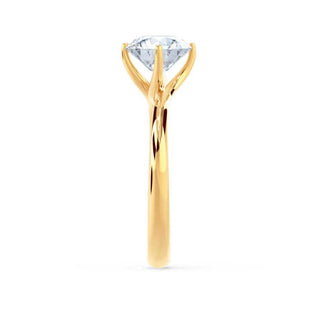 Elegant 1.20ct round solitaire moissanite ring side profile view