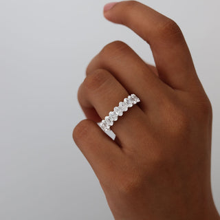 Shimmering 5.46ct oval full eternity moissanite wedding band side profile view